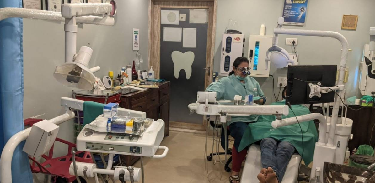 Modern dental treatment room with doctor
